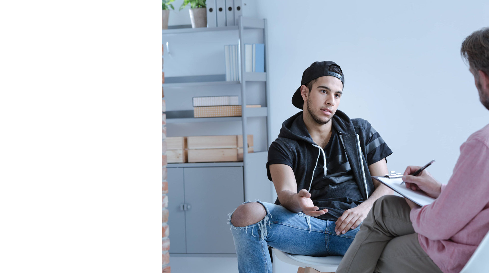 young man having a psychological therapy session