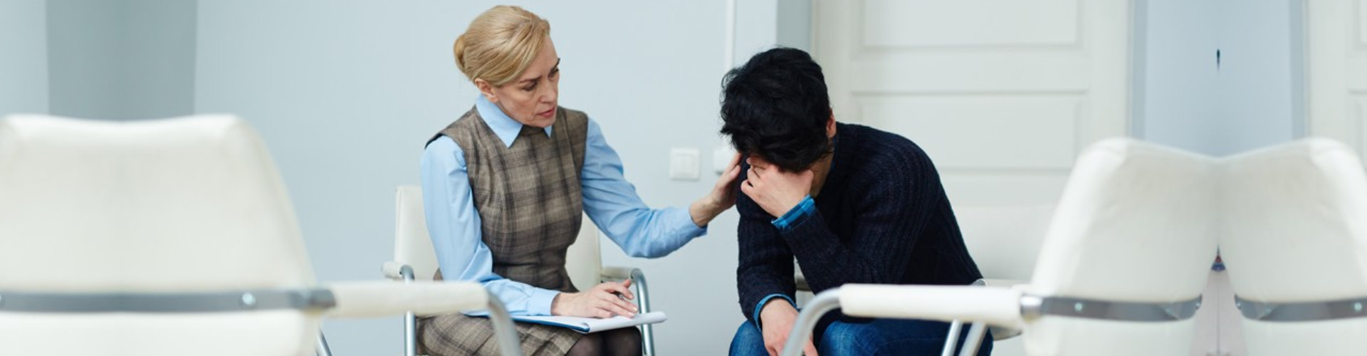 young man having a emotional during the counseling session