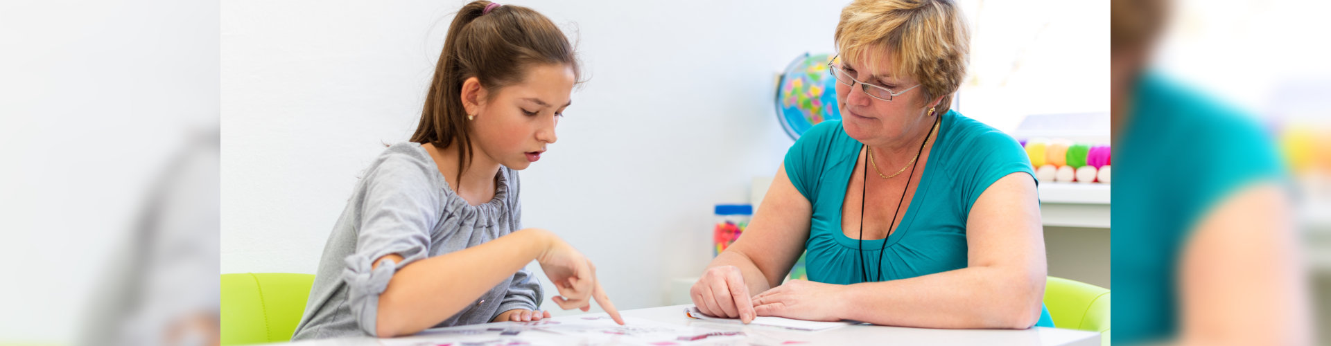 a therapist teaching a kid